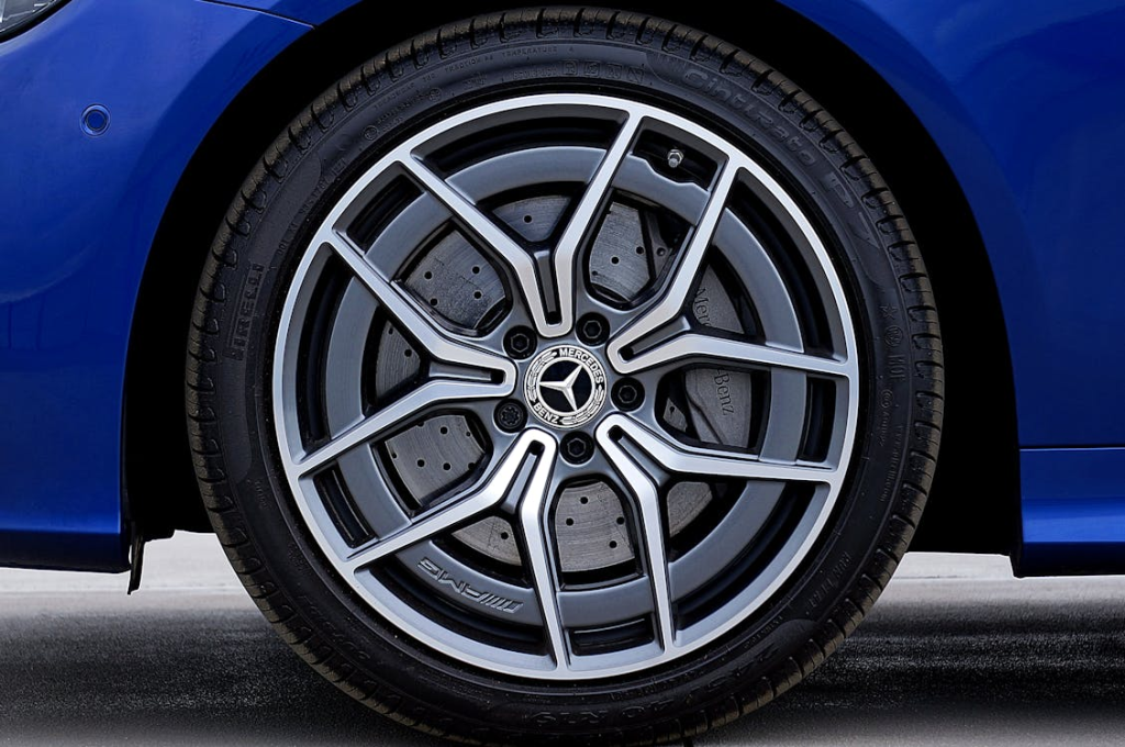 Wheel of a blue car featuring a sleek black rim, showcased as a blog feature image.